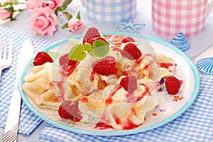 Ravioli (pierogi) with cheese and raspberry