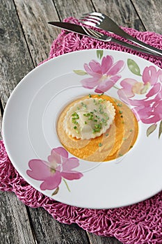 Ravioli and pumpkin-cream puree