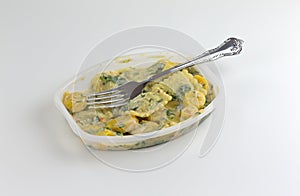 Ravioli with spinach TV dinner with a fork