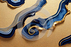 Ravishing blue and golden acrylic liquid ink swirl abstract background.