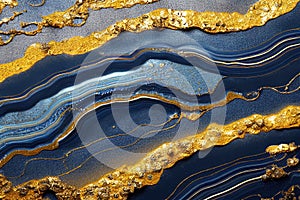 Ravishing blue and golden acrylic liquid ink swirl abstract background.