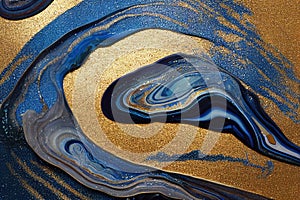 Ravishing blue and golden acrylic liquid ink swirl abstract background.