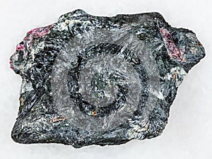 raw aegirine stone on white