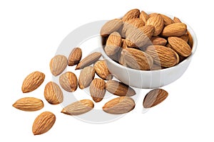 Raw almonds in a white cup isolated on white