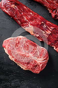 Raw, alternative beef steaks  flap flank Steak, machete steak or skirt cut, Top blade or flat iron beef and tri tip, triangle