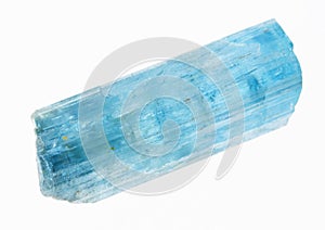 raw aquamarine (blue beryl) crystal on white