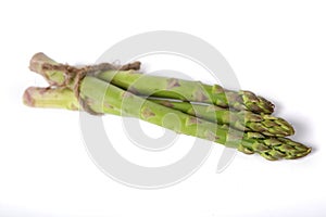 Raw asparagus isolated on white