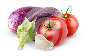 Raw aubergines, tomato and garlic isolated on white background