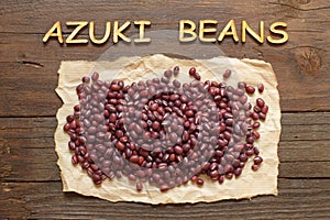 Raw azuki beans with wooden word