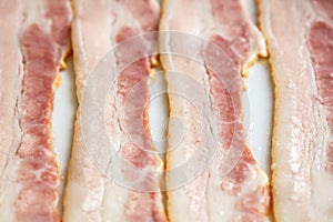 Raw Bacon strips slices