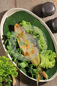 Raw Bandeng Presto Juwana, Milkfish Cooked with Pressure Cooker photo