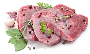 Raw beaf steaks with spices.