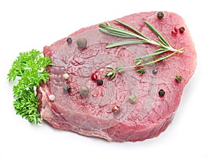 Raw beaf steaks with spices.