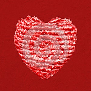 Raw beef burger meat in shape of heart on red background