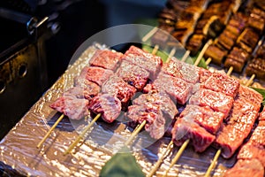 Raw beef fresh Japanese wagyu beef at Tsukiji Fish Market in Tokyo Japan.