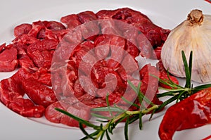 Raw beef meat cut into thin strips