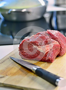 Raw beef meat and knife