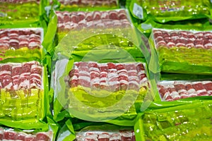 Raw beef meat in plastic box in supermarket