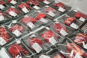 Raw beef meat in plastic box in supermarket