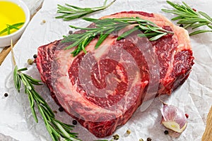 Raw beef rib eye fresh meat steak on white paper