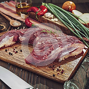Raw beef rump tail with ingredients