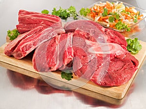 Raw beef shank on cutting board