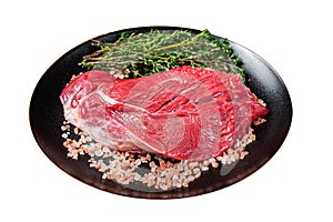 Raw beef sirloin steak with herbs and salt. Isolated on white background.