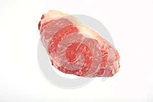 Raw beef sirloin steak isolated on white background