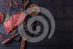 Raw beef steak with spice