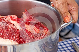 Raw beef steaks inside a pan