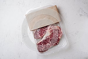 Raw beef Striploin steak in vacuum packaging