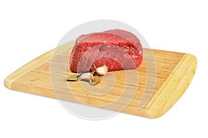 Raw Beef on wooden board