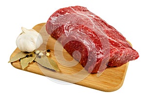 Raw Beef on wooden board