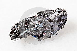 Raw Biotite rock with Kyanite crystals on white photo