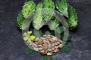 Raw Bitter melon with seed and flower