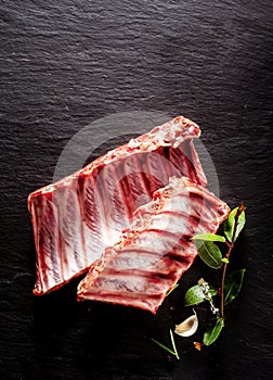 Raw Boar Spare Ribs with Fresh Herbs