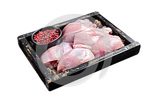 Raw Boneless and skinless Chicken leg thigh fillet with herbs Isolated on white background. Top view.
