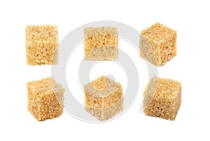 Raw Brown Cane Sugar Cubes Isolated on White Background