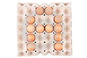 Raw brown Chicken Eggs In paper container tray box arranged English alphabet is ` A `.