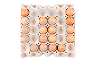 Raw brown Chicken Eggs In paper container tray box arranged English alphabet is ` W `.