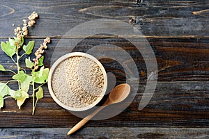 Raw brown quinoa seed Chenopodium quinoa in a bowl