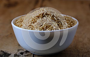 Raw brown rice in a bowl