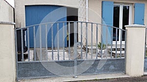 Raw brut steel classic retro design metal gate of vintage style house