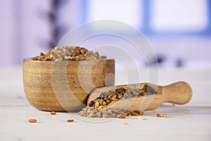 Raw bulgur grains with blue window