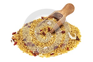 Raw bulgur with spices on white