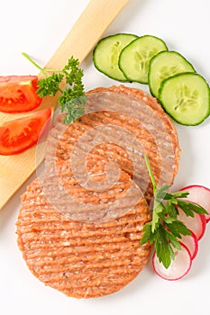 Raw burger patties
