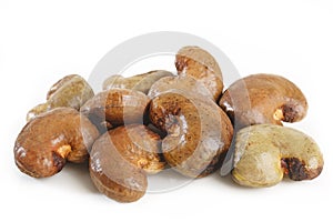 Raw cashew nuts on white