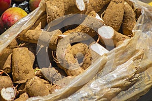 Raw Cassava Starch - Manihot esculenta. Wooden background