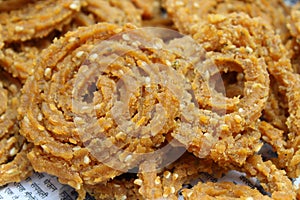 Raw chakali in plate. Indian Traditional Tea Time Snack Chakli, a deep fried snack, It is known as Chakali, Murukku, Muruku,