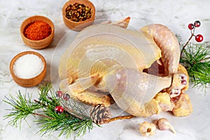 Raw chicken cooked with spices for Christmas dinner.